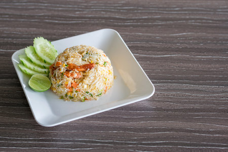 Shrimp fried rice with vegetable on wood table background.の写真素材