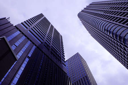 tall office building tokyo station zone , tokyo city , business cityの写真素材