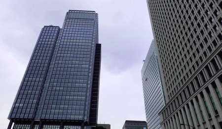 tall office building tokyo station zone , tokyo city , business cityの写真素材
