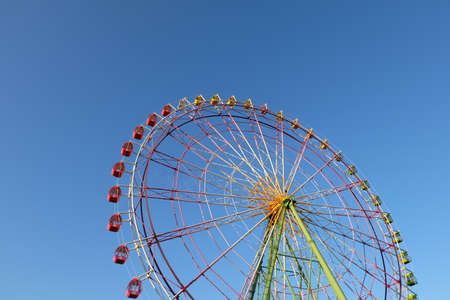 ferris wheel on the nice sky , color ful ferris wheel , ferris wheel in the park backgroundの写真素材