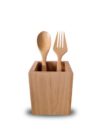 wooden kitchen utensils isolated on white backgroundの写真素材