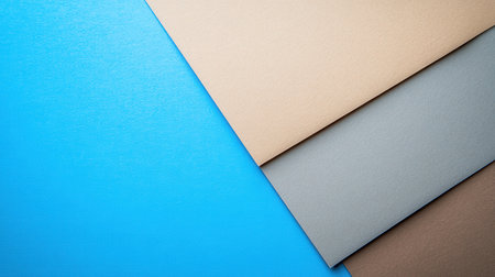 Color papers geometry composition background with beige, brown and blue tonesの素材