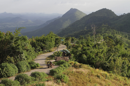 The crooked path over the mountain complex. ETak car Stag climb altitude towards the top of Phu Pa Po The peak of this mountainの写真素材