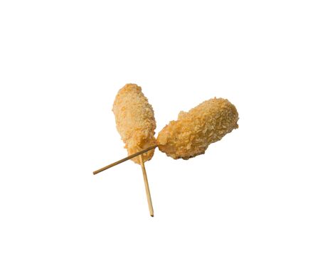 Fried chicken skewers on a white background.の写真素材