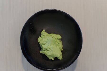Wasabi Japanese placed in a black dishの写真素材