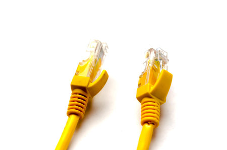 Yellow cable. Computer on a white background.
