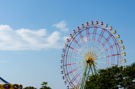 ferris wheel booths with blue sky in japanの写真素材