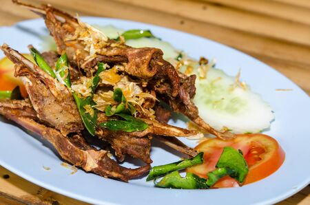 Duck mouth fried garlic on a plate.の写真素材