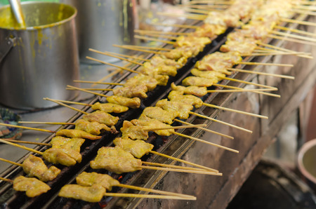 rilled pork satay on the grill Eat with sauceの写真素材