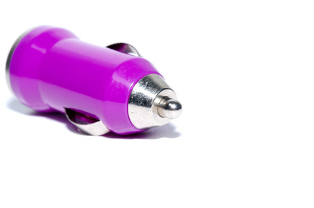 In car charger purple phone isolated white background.