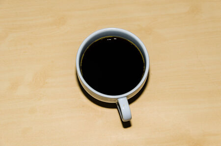 Cup of coffee on the tableの写真素材