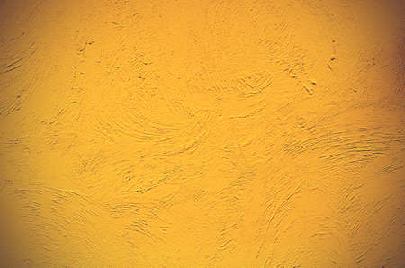 yellow concrete wall texture background.の写真素材