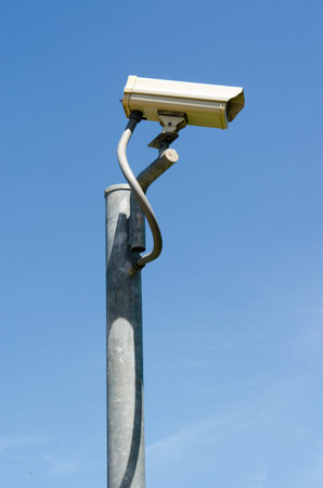 Security cameras on the sky background.