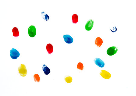 Colorful paint splatter on th white background.
