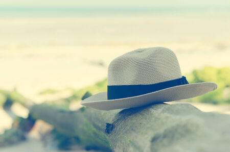 Hat at the beach on the rock.vintageの写真素材