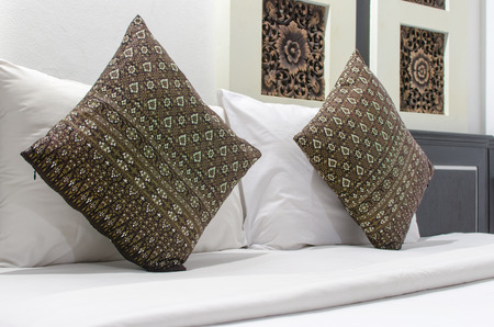 Pillows on the bed in the bedroom.の写真素材