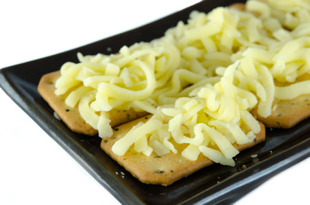 crackers and  Mozzarella with dish on the whiteの写真素材