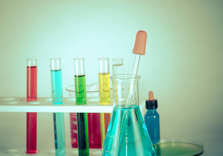 Colored liquids test tubes isolated over white backgroundの写真素材