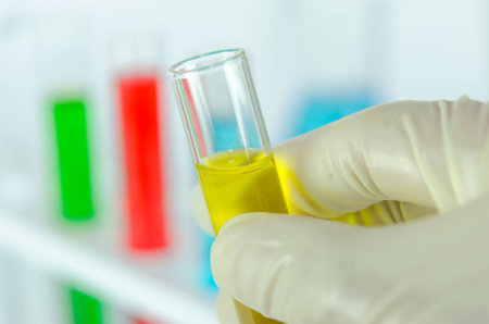 Colored liquids test tubes isolated over white backgroundの写真素材