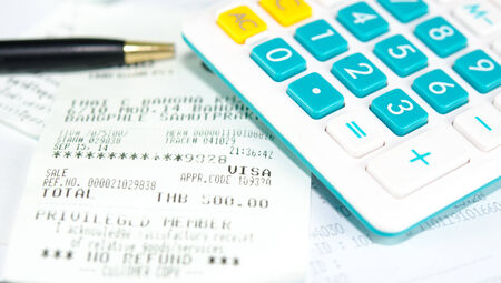 stock image of the receipt paper and calculatorのeditorial素材