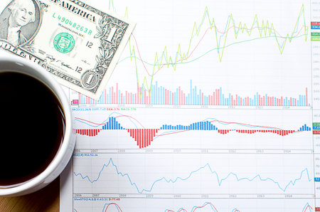 Business diagram on financial report with moneyの写真素材