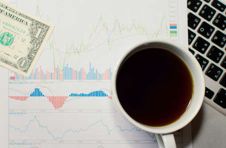 Business diagram on financial report with moneyの写真素材