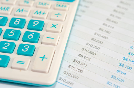 a calculator is on a balance sheet numbers are statistics.