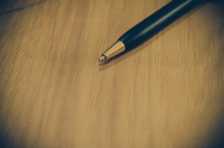 Vintage pen on book.の写真素材