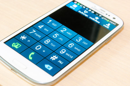 BANGKOK, THAILAND - JUNE 6, 2014: Samsung Galaxy S3 on the table smartphone, Bangkok
