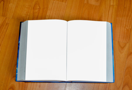 open book on the wood background