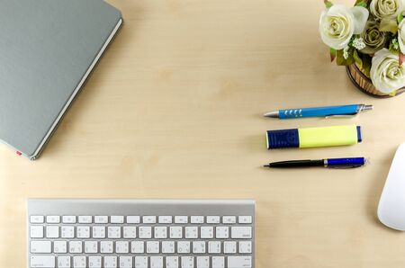 Business desk with keyborad and pen. Top view with copy spaceの写真素材