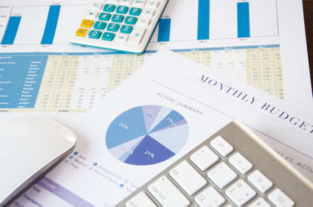 keyboard and pen on finance reportの写真素材