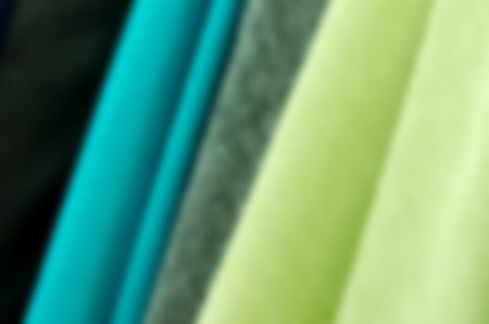 Closeup of various fabric bolts in store.blur background.の写真素材