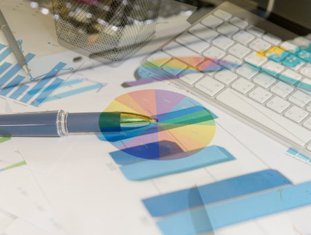keyboard andpen on finance report