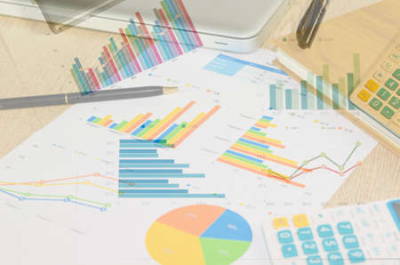 Financial papers, computer and office supplies closeupの写真素材