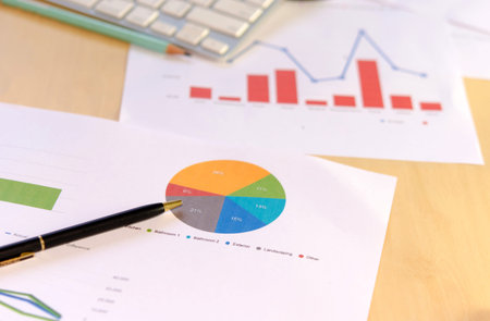 Graphs, charts, business table. The workplace of business people.
