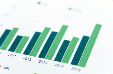 Financial paper charts and graphs on the tableの写真素材