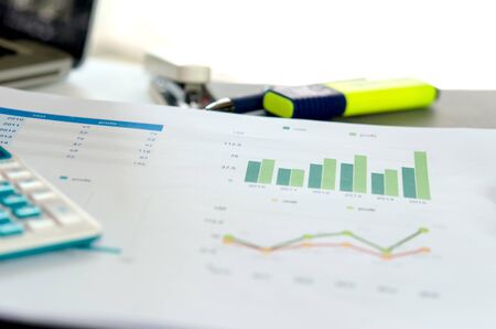 Graphs and charts, business table. The workplace of business people.の写真素材