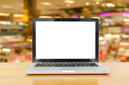 Laptop computer with blank white screen.の写真素材