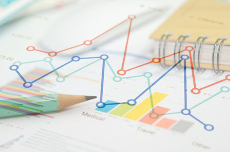 Graphs and charts, business table. The workplace of business people.の写真素材