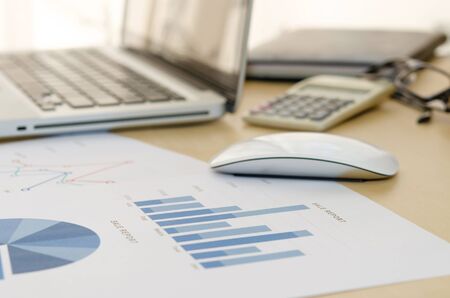 Business of financial analytics desktop with accounting charts and diagramsの写真素材