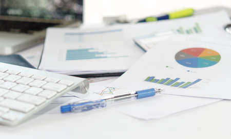 Documents, graphs on a desk.の写真素材