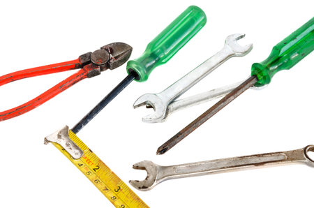 set of construction tools in screwdriver pliers wrench cutter on