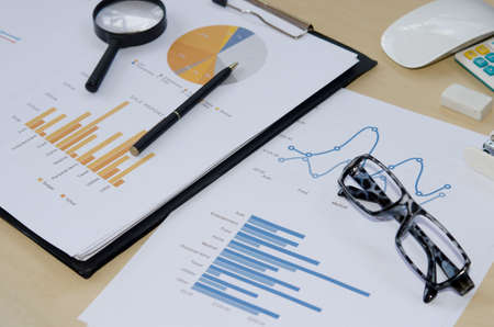 business document report adn pen on desk.の写真素材