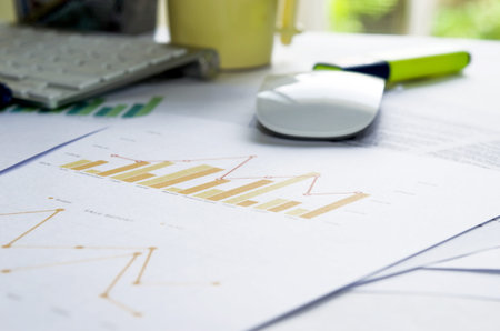 Business of financial analytics desktop with accounting charts and diagrams