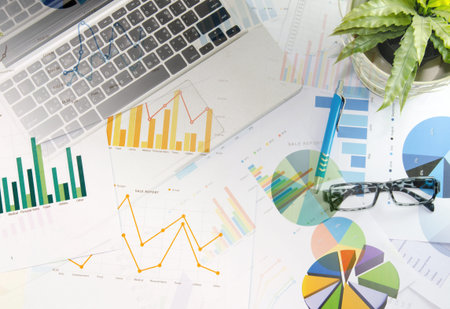 Business Analytics with a Laptop and pen.Business Concept