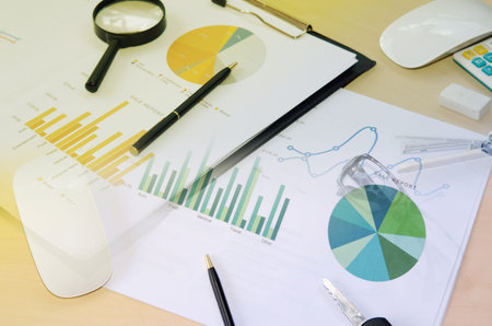 Financial paper charts and graphs on the table, Business Conceptの写真素材