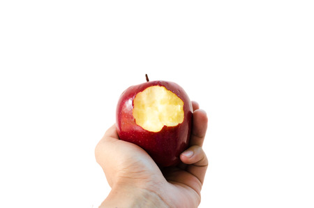 hand red apple isolated on the white.の写真素材