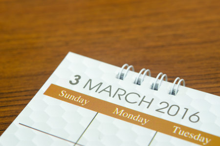 Close up calendar of March 2016 on table.