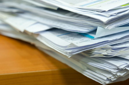 Pile of documents  on desk